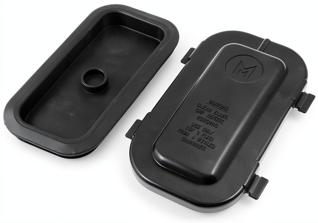 Installing Dorman Brake Master Cylinder Reservoir Cap Kit on a wooden workbench